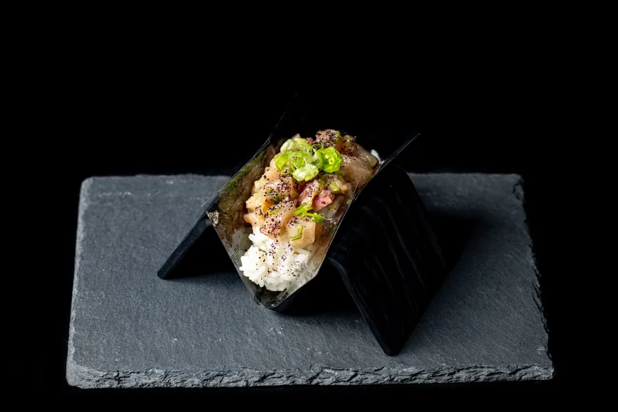 Rollin yellowtail and scallion hand roll sushi, Detroit