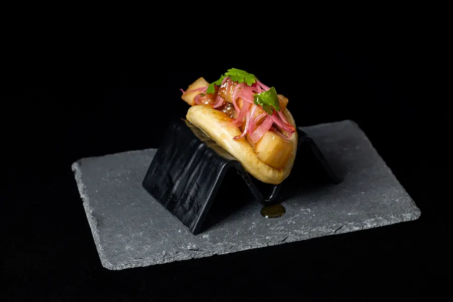 Rollin steamed bao buns with braised pork belly, Asian fusion Detroit